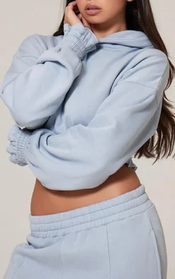 PrettyLittleThing Frill Hem Cropped Hoodie Baby Blue