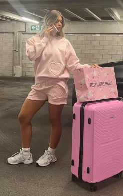 Sale PrettyLittleThing Oversized Heart Embossed Runner Shorts Baby Pink