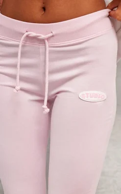 Discount PrettyLittleThing Studio Badge Detail Drawstring Flared Pants Baby Pink
