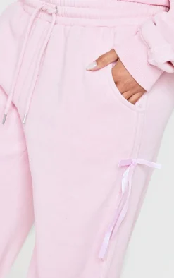 Discount PrettyLittleThing Velvet Bow Wide Leg Sweatpants Baby Pink