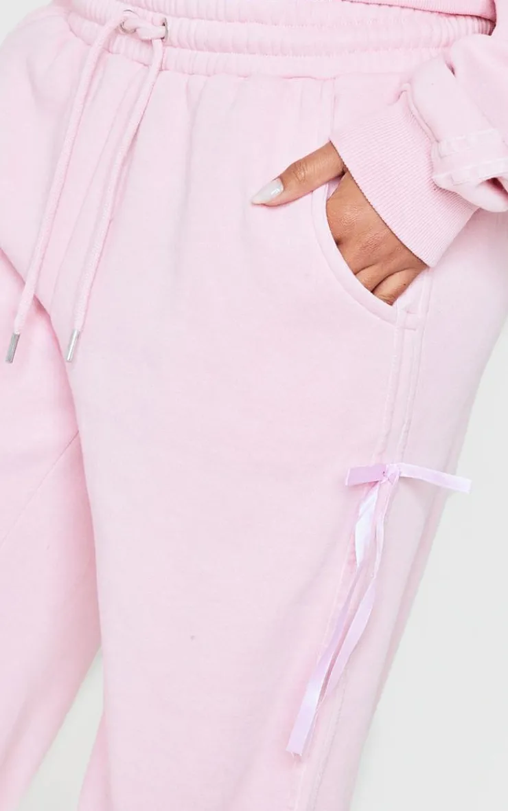 Discount PrettyLittleThing Velvet Bow Wide Leg Sweatpants Baby Pink