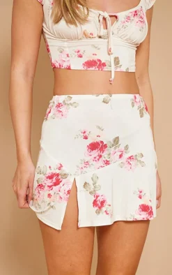 Online PrettyLittleThing Beige Floral Print Slinky Split Hem Micro Mini Skirt Pink