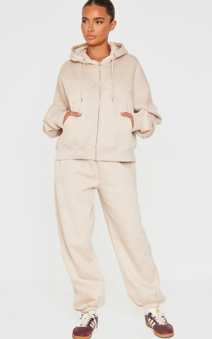 PrettyLittleThing Washed Weekend Applique Thin Waistband Cuffed Sweatpants Beige