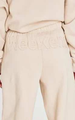 PrettyLittleThing Washed Weekend Applique Thin Waistband Cuffed Sweatpants Beige