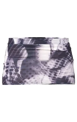 PrettyLittleThing Black Abstract Dot Print Cotton Low Rise Extreme Micro Mini Skirt Intense Black