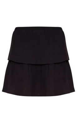 Online PrettyLittleThing Crinkle Texture Tiered Mini Skirt Black