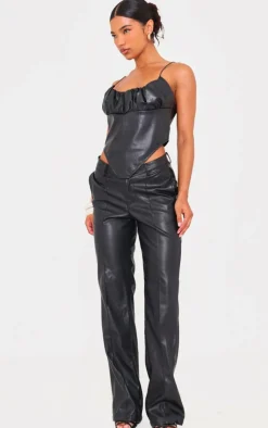 Online PrettyLittleThing Faux Leather Dip Waist Flared Pants Black