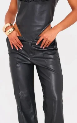 Online PrettyLittleThing Faux Leather Dip Waist Flared Pants Black
