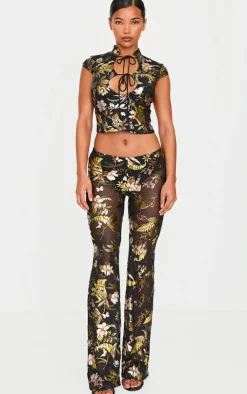 Sale PrettyLittleThing Floral Foil Printed Mesh Flare Pants Black