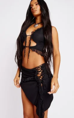 Online PrettyLittleThing Mesh Ruffle Lace Up Asymmetric Mini Skirt Black