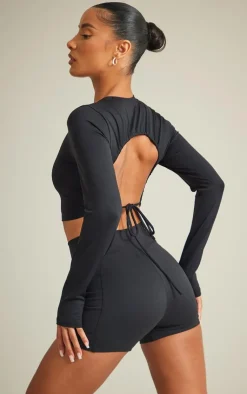 PrettyLittleThing Workout Tops*Sculpt Ruched Cut Out Tie Back Long Sleeve Top