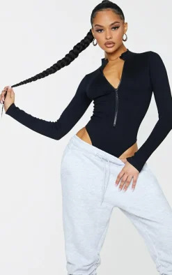 PrettyLittleThing Snatched*Snatched Rib Zip Up Long Sleeve Bodysuit