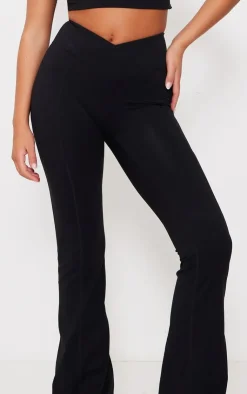 New PrettyLittleThing Snatched Sculpt Wrap Waistband Ruched Bum Flares Black