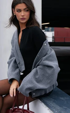 Sale PrettyLittleThing Soft Knit Button Up Bodysuit Black
