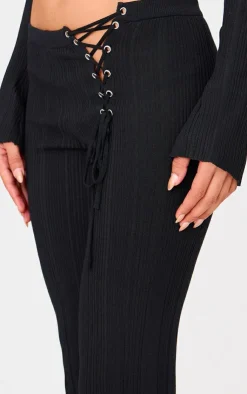 New PrettyLittleThing Textured Rib Knit Lace Up High Waist Flared Pants Black