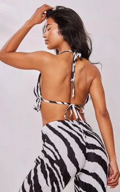 PrettyLittleThing Black Print Plisse Peplum Hem Halterneck Bralet Zebra