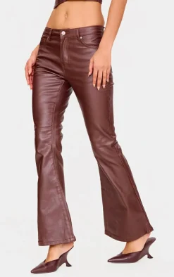 PrettyLittleThing Coated Denim Flared Jeans Brown