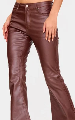 PrettyLittleThing Coated Denim Flared Jeans Brown