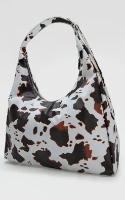 PrettyLittleThing Shoppers*Pu Cow Print Slouchy Oversized Tote Bag