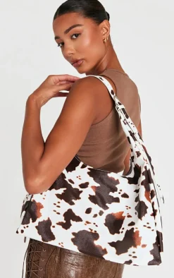 PrettyLittleThing Shoppers*Pu Cow Print Slouchy Oversized Tote Bag
