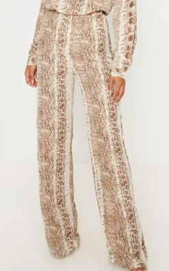 Online PrettyLittleThing Snake Print Wide Leg Pants Brown