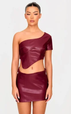 Online PrettyLittleThing Faux Leather Asymmetric Hem Mini Skirt Burgundy