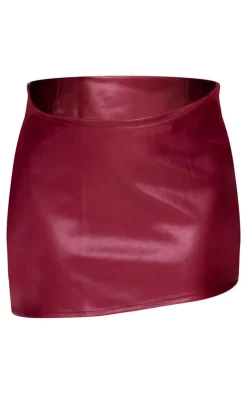 Online PrettyLittleThing Faux Leather Asymmetric Hem Mini Skirt Burgundy