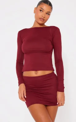 Best PrettyLittleThing Jersey Low Back Long Sleeve Longline Top Burgundy