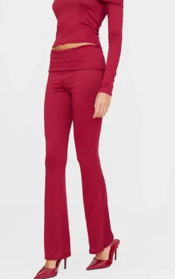 Discount PrettyLittleThing Soft Touch Fold Over Skinny Flares Burgundy