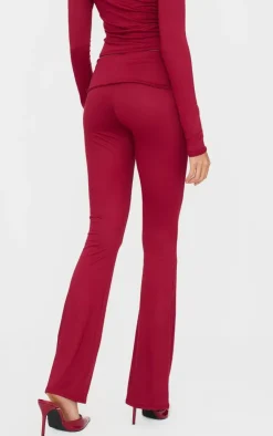 Discount PrettyLittleThing Soft Touch Fold Over Skinny Flares Burgundy