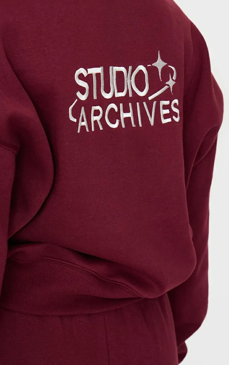 Discount PrettyLittleThing Studio Archives Embroidered Zip Up Jacket Burgundy