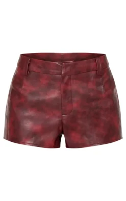 PrettyLittleThing Washed Faux Leather Hot Pants Burgundy