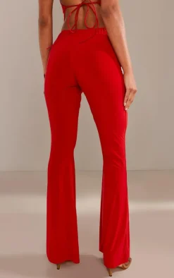 PrettyLittleThing Slinky Low Rise Flared Pants Cherry Red