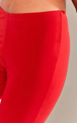 PrettyLittleThing Slinky Low Rise Flared Pants Cherry Red