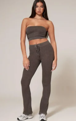 Online PrettyLittleThing Chocolate Faded Snatched Rib Tie Waist Skinny Flared Pants Chocolate.