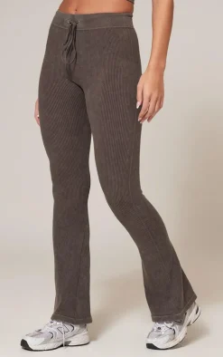 Online PrettyLittleThing Chocolate Faded Snatched Rib Tie Waist Skinny Flared Pants Chocolate.