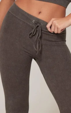 Online PrettyLittleThing Chocolate Faded Snatched Rib Tie Waist Skinny Flared Pants Chocolate.