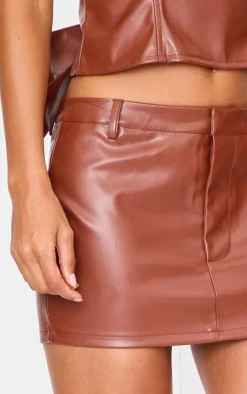 PrettyLittleThing Chocolate Faux Leather Low Rise Mini Skirt Chocolate.
