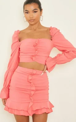New PrettyLittleThing Woven Frill Stretch Ruched Front Mini Skirt Coral