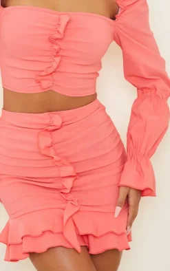 New PrettyLittleThing Woven Frill Stretch Ruched Front Mini Skirt Coral