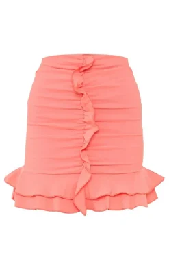 New PrettyLittleThing Woven Frill Stretch Ruched Front Mini Skirt Coral