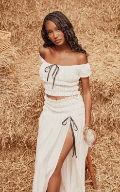 PrettyLittleThing Bardot Shirred Bow Detail Crop Top Cream