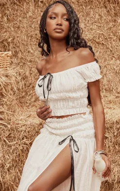 PrettyLittleThing Bardot Shirred Bow Detail Crop Top Cream