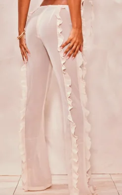 Discount PrettyLittleThing Chiffon Ruffle Dipped Waist Flared Pants Cream