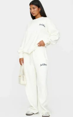 Hot PrettyLittleThing Contrast Embroidered Saint Louis Oversize Sweatshirt Cream