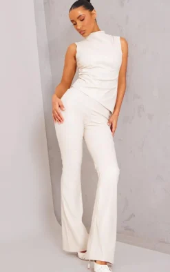 Online PrettyLittleThing Faux Leather High Neck Asymmetric Hem Side Ruched Top Cream