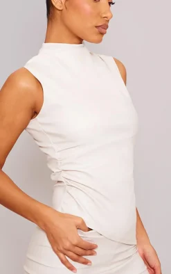 Online PrettyLittleThing Faux Leather High Neck Asymmetric Hem Side Ruched Top Cream