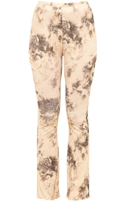Online PrettyLittleThing Onion Skin Printed Hem Detail Flared Pants Cream