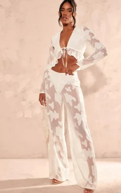 PrettyLittleThing Sheer Woven Floral Devore Wide Leg Pants Cream