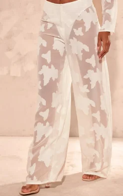 PrettyLittleThing Sheer Woven Floral Devore Wide Leg Pants Cream